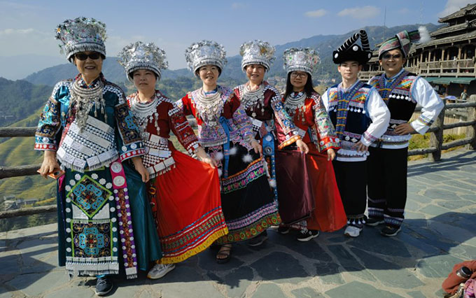 Company Anniversary: Guangxi Terraced Fields Trip and Ethnic Clothing Experience